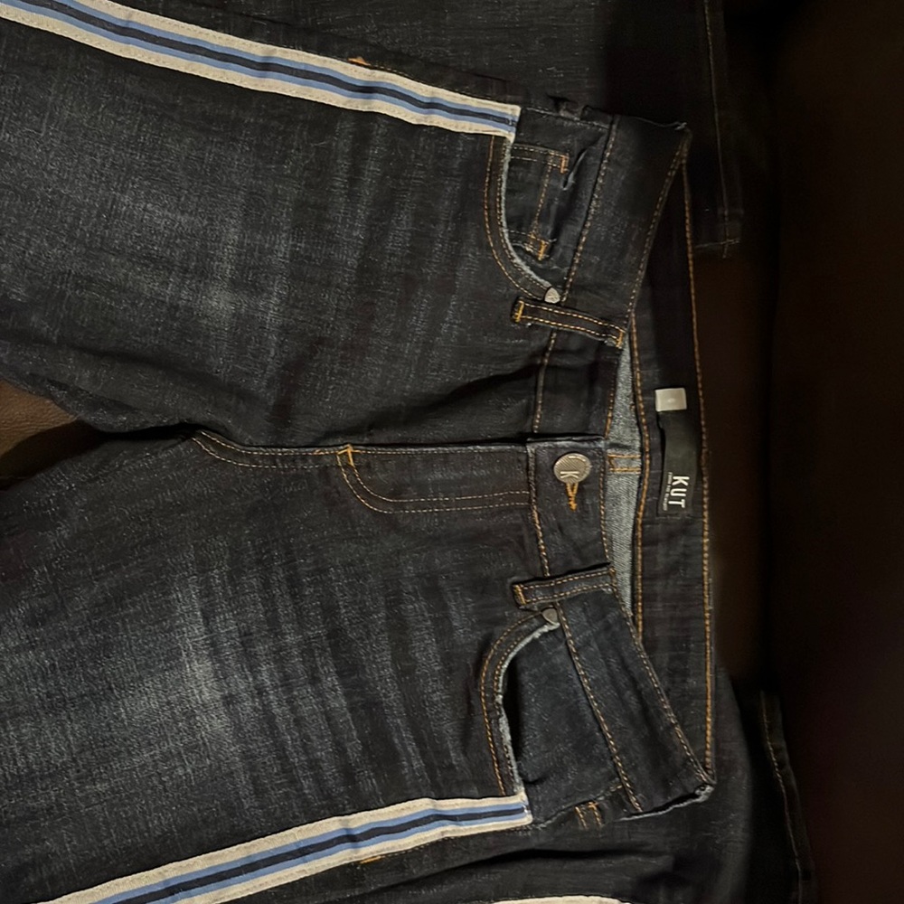 Great Kut Jeans with back pockets and ribbon trim on the sides